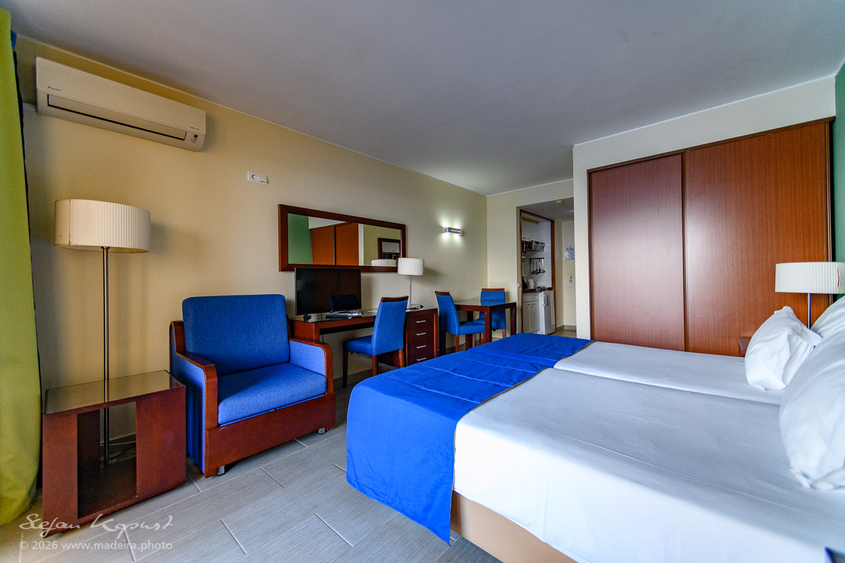 Studio im Cais da Oliveira mit Bett und Sitzbereich